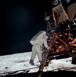 Aldrin climbing down the ladder. He was careful not to close the hatch. (Image credit: Neil Armstrong/NASA)